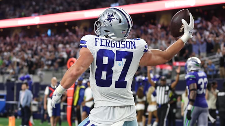 Nov 30, 2023; Arlington, Texas, USA; Dallas Cowboys tight end Jake Ferguson (87) celebrates after a touchdown catch during the second half against the Seattle Seahawks at AT&T Stadium. Mandatory Credit: Tim Heitman-Imagn Images