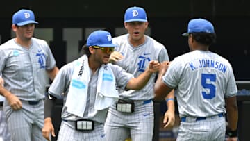 Jun 8, 2025; Durham, NC, USA; The Duke Blue Devils dugout reacts to Duke outfielder and pitcher Kyle Johnson's (5) pitching performance in the first inning against Murray State.