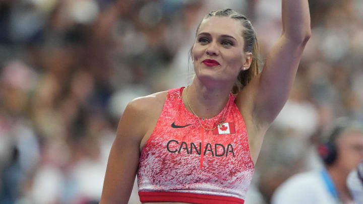 Aug 7, 2024; Saint-Denis, FRANCE;  Alysha Newman (CAN) reacts in the women's pole vault final during the Paris 2024 Olympic Summer Games at Stade de France. 