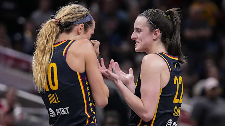Sep 15, 2024; Indianapolis, Indiana, USA; Indiana Fever guard Caitlin Clark (22) and guard Lexie Hull (10) talk during a timeout at Gainbridge Fieldhouse. Mandatory Credit: Grace Hollars/USA TODAY Network via Imagn Images Sep 15, 2024; Indianapolis, Indiana, USA; Indiana Fever guard Caitlin Clark (22) and guard Lexie Hull (10) talk during a timeout at Gainbridge Fieldhouse. Mandatory Credit: Grace Hollars/USA TODAY Network via Imagn Images