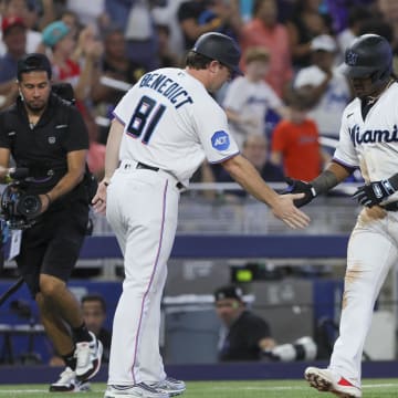 Jul 30, 2023; Miami, Florida, USA; Miami Marlins third baseman Jean Segura (9) celebrates with third base coach Griffin Benedict (81) after hitting a home run against the Detroit Tigers during the eighth inning at loanDepot Park. 