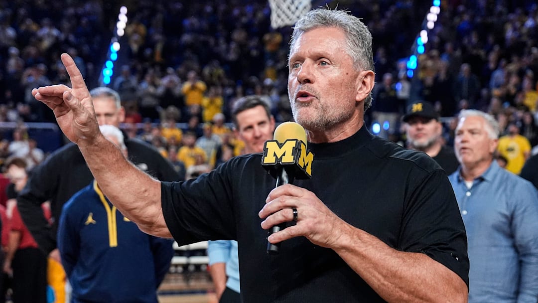 Michigan football head coach Kyle Whittingham speaks as he is being introduced on the floor during the first half between Michigan and USC at Crisler Center in Ann Arbor on Friday, Jan. 2, 2026.