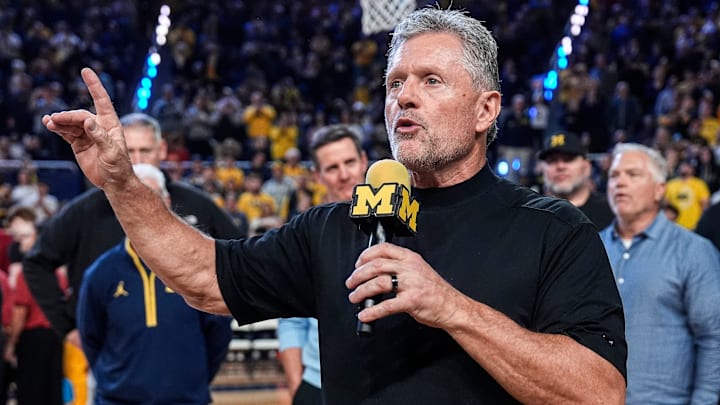 Michigan football head coach Kyle Whittingham speaks as he is being introduced on the floor during the first half between Michigan and USC at Crisler Center in Ann Arbor on Friday, Jan. 2, 2026.