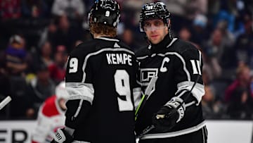 Nov 25, 2023; Los Angeles, California, USA; Los Angeles Kings center Anze Kopitar (11) speaks with center Adrian Kempe (9) during the third period at Crypto.com Arena. Mandatory Credit: Gary A. Vasquez-Imagn Images