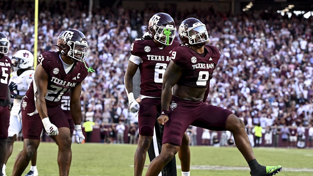 Sep 27, 2025; College Station, Texas, USA; Texas A&M Aggies defensive end Cashius Howell (9) reacts after sacking Auburn Tigers quarterback Jackson Arnold (not pictured) during the fourth quarter at Kyle Field. Mandatory Credit: Maria Lysaker-Imagn Images 