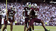 Sep 27, 2025; College Station, Texas, USA; Texas A&M Aggies defensive end Cashius Howell (9) reacts after sacking Auburn Tigers quarterback Jackson Arnold (not pictured) during the fourth quarter at Kyle Field. Mandatory Credit: Maria Lysaker-Imagn Images 