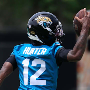 Jacksonville Jaguars wide receiver Travis Hunter (12) catches a pass during a rookie minicamp at Miller Electric Center Saturday, May 10, 2025 in Jacksonville, Fla. [Corey Perrine/Florida Times-Union]