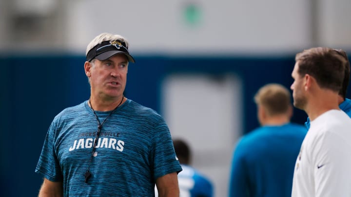 Jacksonville Jaguars head coach Doug Pederson, left, talks with offensive coordinator Press Taylor during the second day of a mandatory minicamp Tuesday, June 11, 2024 at EverBank Stadium’s Miller Electric Center in Jacksonville, Fla. [Corey Perrine/Florida Times-Union]