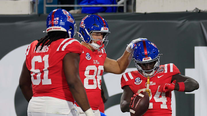 Mississippi Rebels running back Ulysses Bentley IV (24) is congratulated by Mississippi Rebels tight end Caden Prieskorn (86) for his touchdown score during the third quarter of the TaxSlayer Gator Bowl Thursday, Jan. 2, 2025 at EverBank Stadium in Jacksonville, Fla. Ole Miss defeated Duke 52-20. [Corey Perrine/Florida Times-Union]