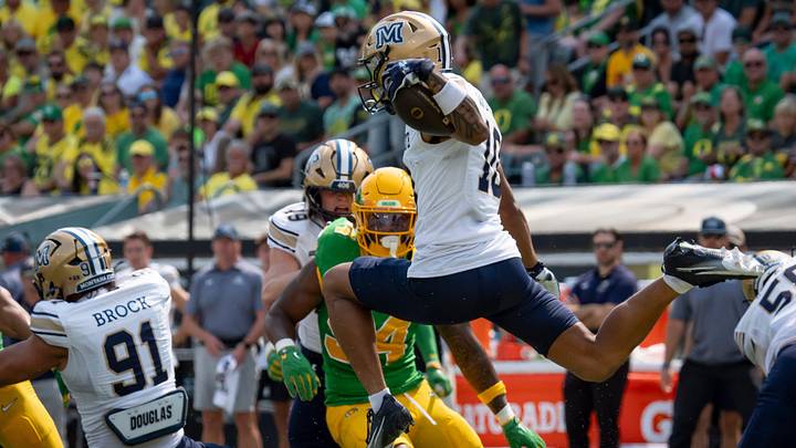 Montana State wide receiver Jabez Woods hurdles through the defense as the Oregon Ducks host the Montana State Bobcats on Aug. 30, 2025, at Autzen Stadium in Eugene, Oregon.