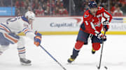 Feb 23, 2025; Washington, District of Columbia, USA; Washington Capitals left wing Alex Ovechkin (8) skates with the puck as Edmonton Oilers right wing Vasily Podkolzin (92) defends in the second period at Capital One Arena. Mandatory Credit: Geoff Burke-Imagn Images
