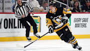 Nov 27, 2024; Pittsburgh, Pennsylvania, USA;  Pittsburgh Penguins right wing Rickard Rakell (67) skates with the puck against the Vancouver Canucks during the third period at PPG Paints Arena. Mandatory Credit: Charles LeClaire-Imagn Images