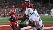 Sep 20, 2024; Pullman, Washington, USA; San Jose State Spartans wide receiver TreyShun Hurry (2) catches the ball for a touchdown against Washington State Cougars defensive back Adrian Wilson (6) in the second half at Gesa Field at Martin Stadium. Mandatory Credit: James Snook-Imagn Images