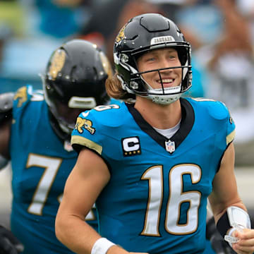 Jacksonville Jaguars quarterback Trevor Lawrence (16) reacts to a long catch and run from wide receiver Christian Kirk (13), not shown, during the fourth quarter of an NFL football matchup Sunday, Oct. 6, 2024 at EverBank Stadium in Jacksonville, Fla. The Jaguars edged the Colts on a field goal 37-34. [Corey Perrine/Florida Times-Union]