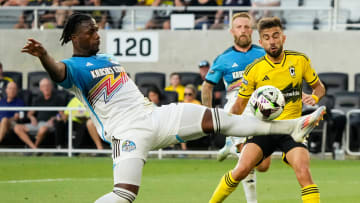 Aug 9, 2024; Columbus, OH, USA; Sporting Kansas City defender Dany Rosero (5) kicks the ball away from Columbus Crew forward Diego Rossi (10) during the first half of the Leagues Cup soccer match at Lower.com Field. The Crew won 4-0.