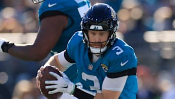 Jacksonville Jaguars quarterback C.J. Beathard (3) rushes for yards during the third quarter of a regular season NFL football matchup Sunday, Dec. 31, 2023 at EverBank Stadium in Jacksonville, Fla. 
