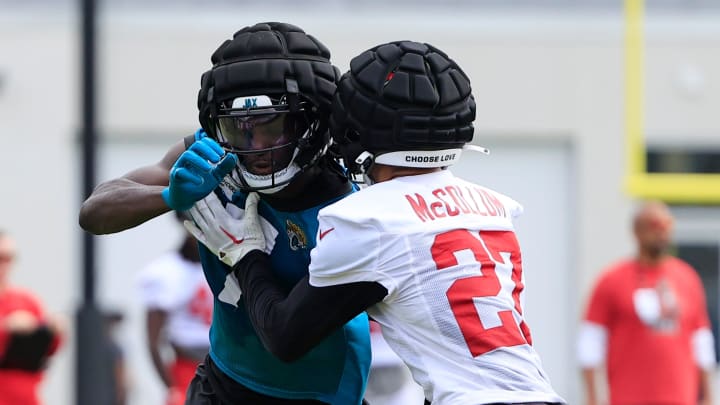 Tampa Bay Buccaneers cornerback Zyon McCollum (27) pressures Jacksonville Jaguars wide receiver Brian Thomas Jr. (7) during a combined NFL football training camp session between the Tampa Bay Buccaneers and Jacksonville Jaguars Thursday, Aug. 15, 2024 at EverBank Stadium’s Miller Electric Center in Jacksonville, Fla. [Corey Perrine/Florida Times-Union]