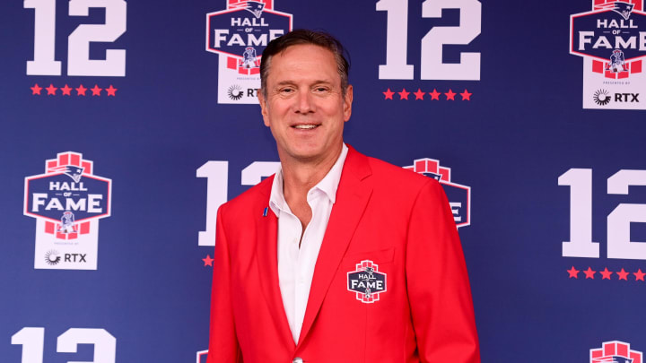 Former Patriots quarterback Drew Bledsoe poses for a photo at the New England Patriots Hall of Fame induction ceremony for Tom Brady at Gillette Stadium.