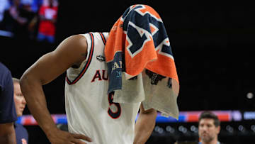 Apr 5, 2025; San Antonio, TX, USA;  Auburn Tigers forward Chris Moore (5) reacts as he comes off the court after losing to the Florida Gators in the semifinals of the men's Final Four of the 2025 NCAA Tournament at the Alamodome. Mandatory Credit: Robert Deutsch-Imagn Images