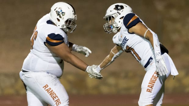 Riverside's Carlos Rojas III (11) celebrates a TD at a high school football game against Bowie on Nov. 3, 2023 in El Paso.