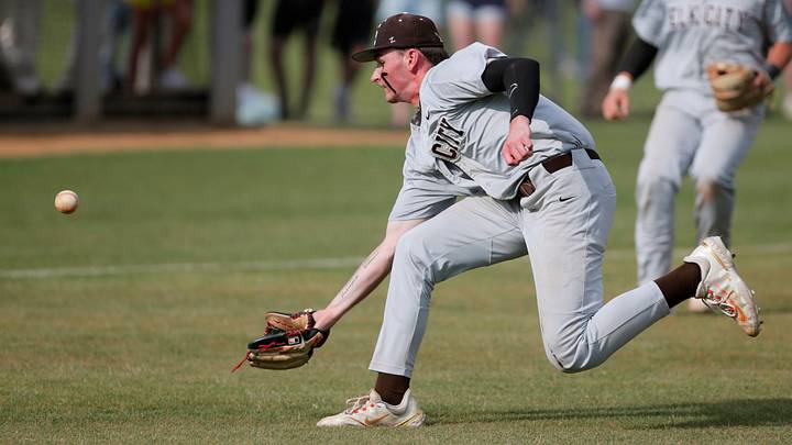 Elk City's Kash Mayfield chases down the ball in the third inning of a class 4A baseball state tournament game between Tuttle and Elk City in Edmond, Okla., Friday, May 12, 2023.