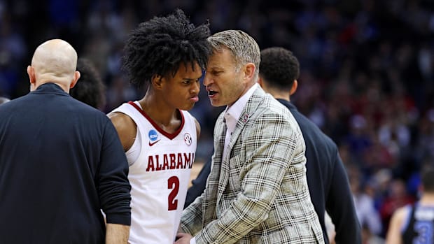 Alabama Crimson Tide guard Aden Holloway (2) talks to head coach Nate Oats during the second half against BYU.