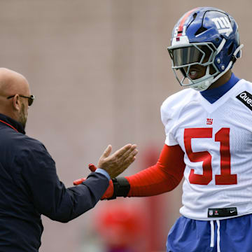 May 10, 2025; East Rutherford, NJ, USA; New York Giants head coach Brian Daboll greets linebacker Abdul Carter (51) during rookie minicamp at Quest Diagnostics Training Center. Mandatory Credit: John Jones-Imagn Images