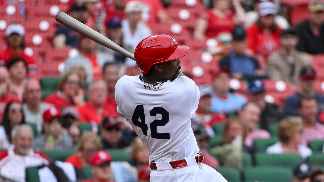 Apr 15, 2026; St. Louis, Missouri, USA; St. Louis Cardinals right fielder Jordan Walker (18) hits a double against the Cleveland Guardians during the eighth inning at Busch Stadium. Players and coaches are wearing number 42 in recognition of Jackie Robinson Day. Mandatory Credit: Jeff Curry-Imagn Images