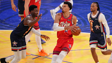 Feb 16, 2025; San Francisco, CA, USA; Chuckís Global Stars forward Victor Wembanyama (1) of the San Antonio Spurs drives to the basket against Kennyís Young Stars during the 2025 NBA All Star Game at Chase Center. Mandatory Credit: Cary Edmondson-Imagn Images