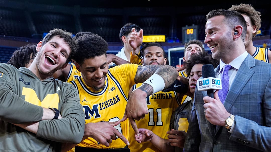 Michigan forward Yaxel Lendeborg (23), center, celebrates 86-61 win over Middle Tennessee as he’s interviewed by Big Ten analyst Nik Stauskas at Crisler Center in Ann Arbor on Wednesday, Nov. 19, 2025. Michigan forward Yaxel Lendeborg (23), center, celebrates 86-61 win over Middle Tennessee as he’s interviewed by Big Ten analyst Nik Stauskas at Crisler Center in Ann Arbor on Wednesday, Nov. 19, 2025.