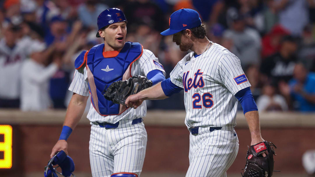 Aug 27, 2025; New York City, New York, USA; New York Mets starting pitcher Nolan McLean (26) fist bumps catcher Hayden Senger (30) after the bottom of the eighth inning against the Philadelphia Phillies at Citi Field. Mandatory Credit: Vincent Carchietta-Imagn Images