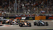 [US, Mexico & Canada customers only] April 13, 2025; Sakhir, BAHRAIN; Oscar Piastri leads George Russell into the first corner at the start of the race during the F1 Bahrain Grand Prix at the Bahrain International Circuit. Mandatory Credit: Rula Rouhana/Reuters via Imagn Images
