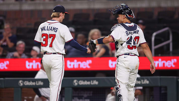 Aug 18, 2025; Atlanta, Georgia, USA; Atlanta Braves shortstop Luke Williams (37) celebrates with catcher Drake Baldwin (30) after pitching against the Chicago White Sox in the eighth inning at Truist Park. Mandatory Credit: Brett Davis-Imagn Images
