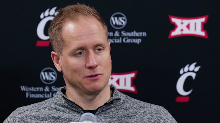 Mar 3, 2026; Cincinnati, Ohio, USA;  BYU Cougars head coach Kevin Young answers media questions after his team’s game against the Cincinnati Bearcats at Fifth Third Arena. Mandatory Credit: Aaron Doster-Imagn Images