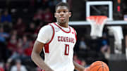 Nov 21, 2024; Spokane, Washington, USA; Washington State Cougars guard Cedric Coward (0) controls the ball against the Eastern Washington Eagles in the second half at Spokane Veterans Memorial Arena. Mandatory Credit: James Snook-Imagn Images