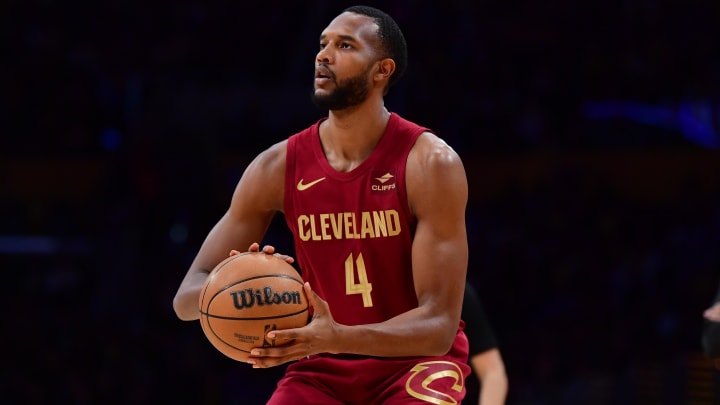 Apr 6, 2024; Los Angeles, California, USA; Cleveland Cavaliers forward Evan Mobley (4) shoots against the Los Angeles Lakers during the first half at Crypto.com Arena. Mandatory Credit: Gary A. Vasquez-USA TODAY Sports