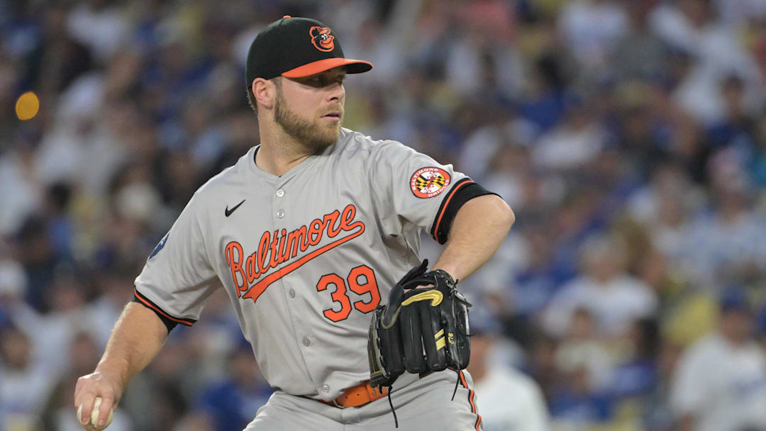 Aug 28, 2024; Los Angeles, California, USA;  Baltimore Orioles starting pitcher Corbin Burnes (39) delivers to the plate in the first inning against the Los Angeles Dodgers at Dodger Stadium. Mandatory Credit: Jayne Kamin-Oncea-Imagn Images