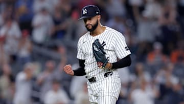 Jul 29, 2025; Bronx, New York, USA; New York Yankees relief pitcher Devin Williams (38) reacts after defeating the Tampa Bay Rays at Yankee Stadium. Mandatory Credit: Brad Penner-Imagn Images