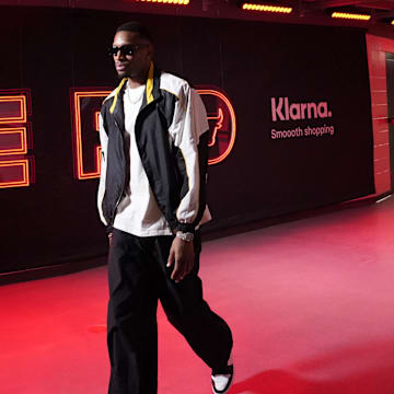 Chicago Bulls forward Torrey Craig (13) enters the building before the game against the Boston Celtics at United Center. 