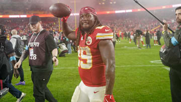 Nov 4, 2024; Kansas City, Missouri, USA; Kansas City Chiefs running back Kareem Hunt (29) celebrates toward fans after scoring the game-winning touchdown in overtime against the Tampa Bay Buccaneers at GEHA Field at Arrowhead Stadium. Mandatory Credit: Denny Medley-Imagn Images