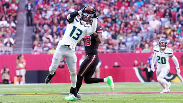 Seattle Seahawks linebacker Ernest Jones IV (13) intercepts a pass against the Arizona Cardinals.