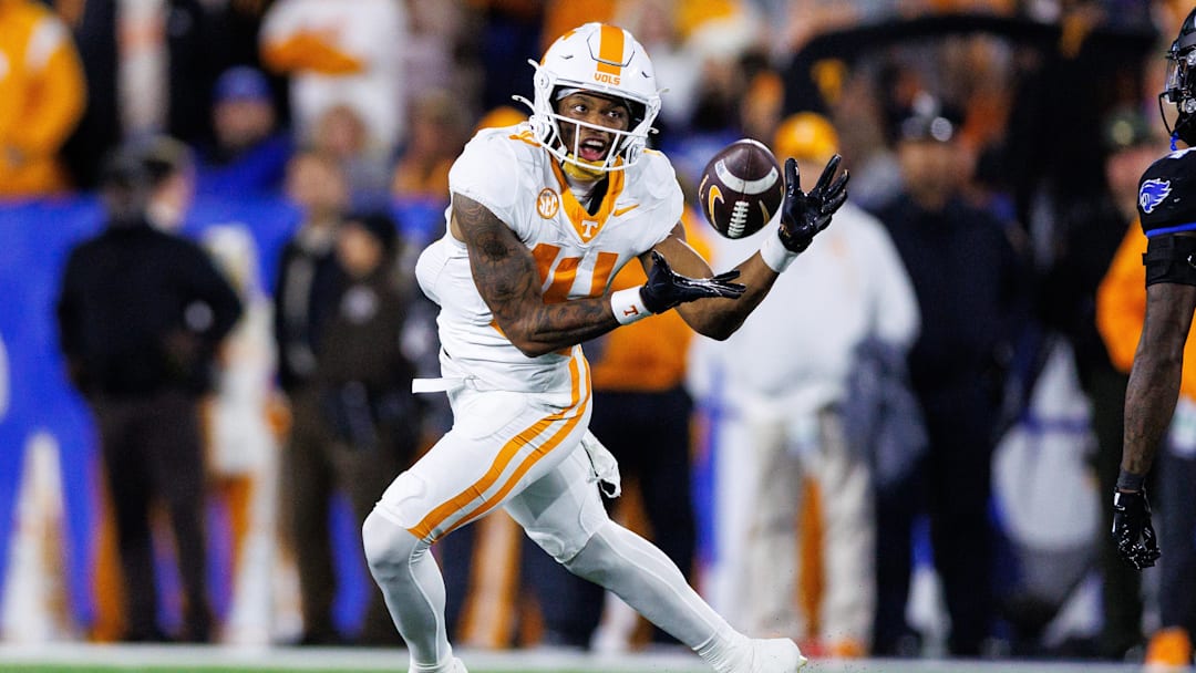 Oct 25, 2025; Lexington, Kentucky, USA; Tennessee Volunteers wide receiver Braylon Staley (14) catches a pass during the third quarter against the Kentucky Wildcats at Kroger Field. Mandatory Credit: Jordan Prather-Imagn Images