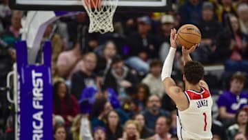 Mar 19, 2025; Salt Lake City, Utah, USA;  Washington Wizards guard Colby Jones (1) attempts a free throw against the Utah Jazz during the second half at the Delta Center. Mandatory Credit: Peter Creveling-Imagn Images