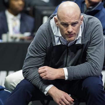 Penn State head coach Cael Sanderson watches a match during the NCAA Wrestling Championships at the BOK Center. 