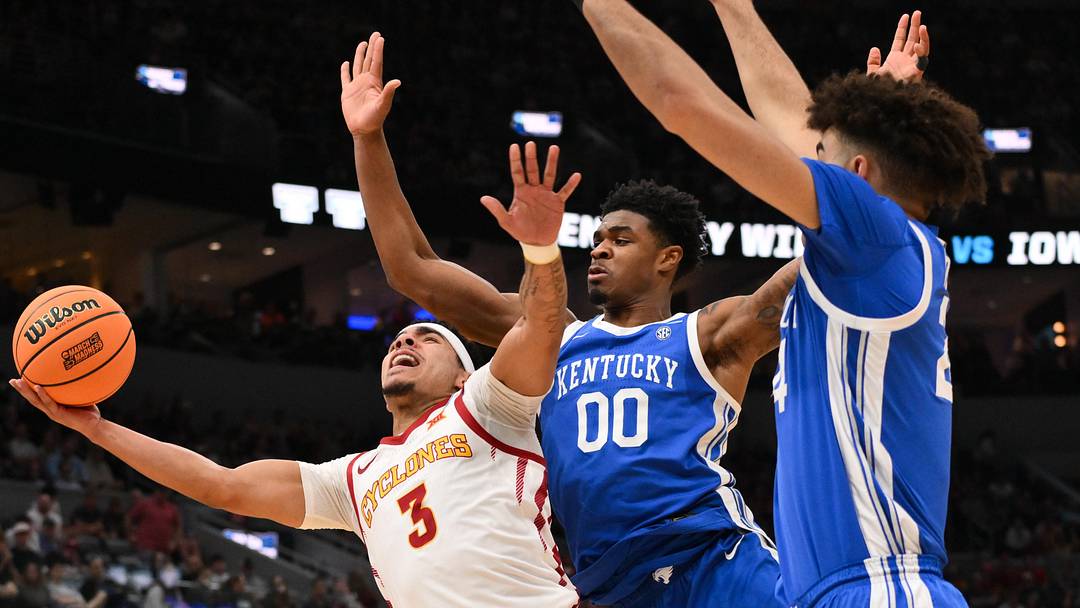 Mar 22, 2026; St. Louis, MO, USA; Iowa State Cyclones guard Tamin Lipsey (3) shoots a lay up as Kentucky Wildcats guard Otega Oweh (00) defends during the first half during a second round game of the men's 2026 NCAA Tournament at Enterprise Center. Mandatory Credit: Jeff Curry-Imagn Images Mar 22, 2026; St. Louis, MO, USA; Iowa State Cyclones guard Tamin Lipsey (3) shoots a lay up as Kentucky Wildcats guard Otega Oweh (00) defends during the first half during a second round game of the men's 2026 NCAA Tournament at Enterprise Center. Mandatory Credit: Jeff Curry-Imagn Images