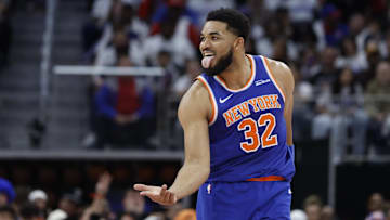 Apr 24, 2025; Detroit, Michigan, USA; New York Knicks center Karl-Anthony Towns (32) celebrates a three point basket in the first half against the Detroit Pistons during game three of first round for the 2024 NBA Playoffs at Little Caesars Arena. Mandatory Credit: Rick Osentoski-Imagn Images