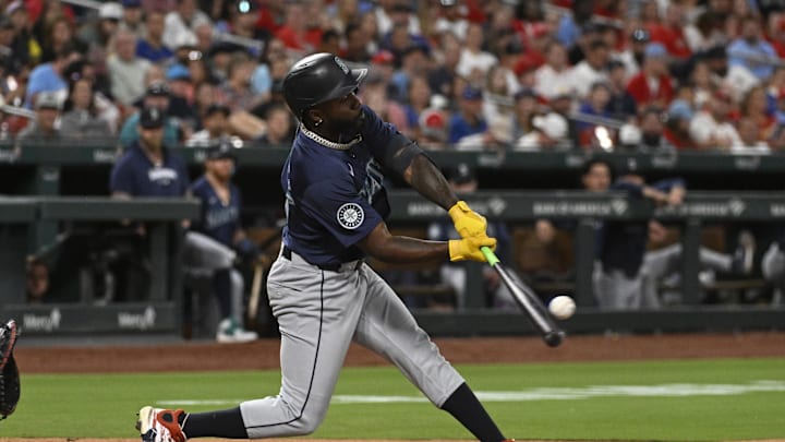 Seattle Mariners left fielder Randy Arozarena (56) hits a sacrifice fly against the St. Louis Cardinals in the fifth inning at Busch Stadium on Sept 6.