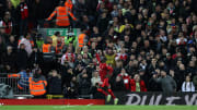 Sadio Mane celebrates Liverpool's opening goal in a 4-0 romp against Arsenal