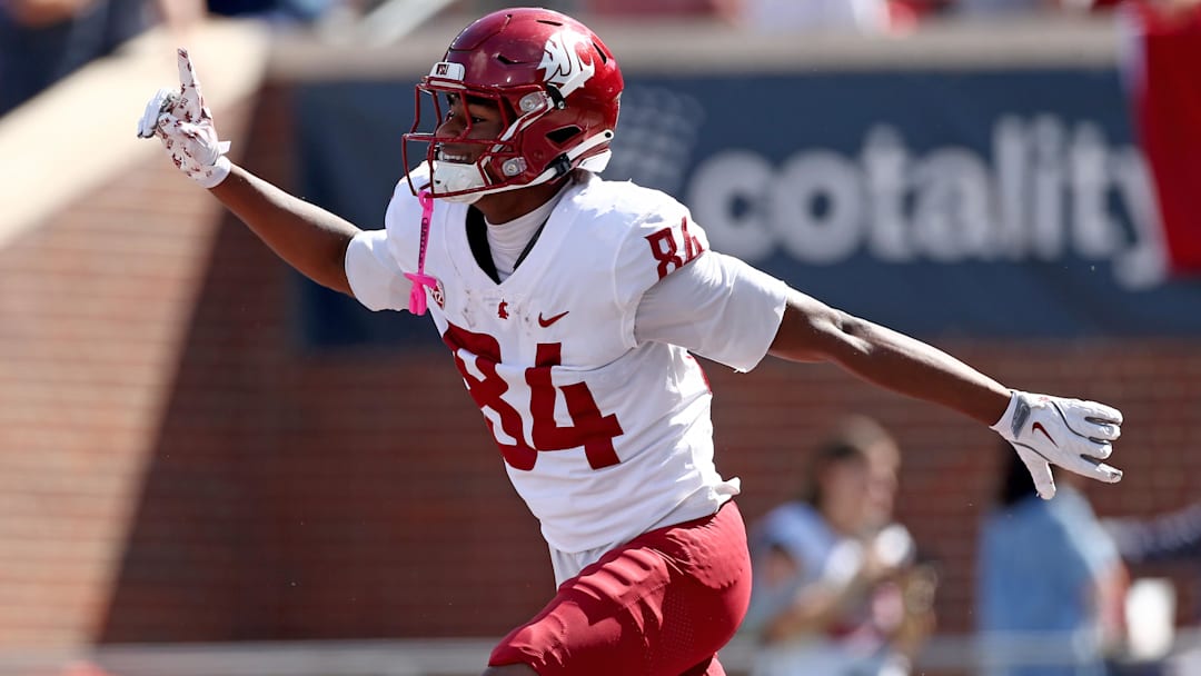 Oct 11, 2025; Oxford, Mississippi, USA; Washington State Cougars wide receiver Landon Wright (84) reacts after a touchdown during the first quarter against the Mississippi Rebels at Vaught-Hemingway Stadium. Mandatory Credit: Petre Thomas-Imagn Images