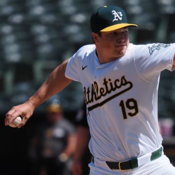 May 1, 2024; Oakland, California, USA; Oakland Athletics relief pitcher Mason Miller (19) pitches the ball against the Pittsburgh Pirates during the ninth inning at Oakland-Alameda County Coliseum.